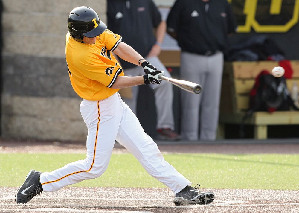 Iowa Hawkeyes designated hitter Austin Martin (34) hits an RBI single during the third inning of their game against Northern Illinois at Duane Banks Field in Iowa City on Tuesday, Apr. 16, 2019. (Stephen Mally/hawkeyesports.com)
