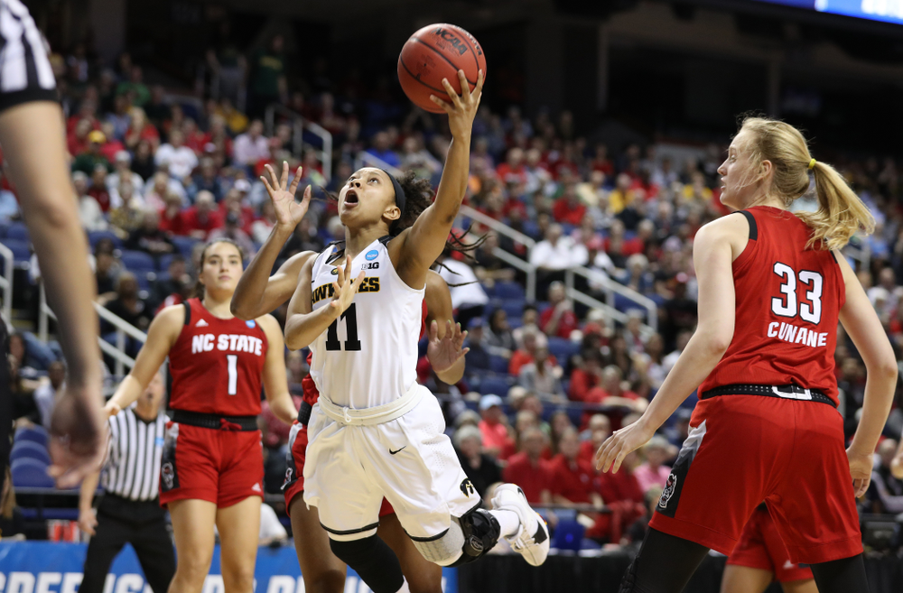 Iowa Hawkeyes guard Tania Davis (11) against the NC State Wolfpack in the regional semi-final of the 2019 NCAA Women's College Basketball Tournament Saturday, March 30, 2019 at Greensboro Coliseum in Greensboro, NC.(Brian Ray/hawkeyesports.com)