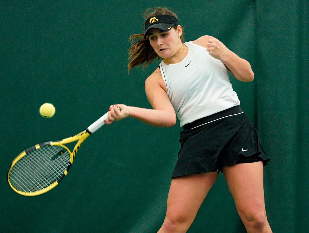 Iowa’s Danielle Bauers returns a shot during her singles match at the Hawkeye Tennis and Recreation Complex in Iowa City on Sunday, February 16, 2020. (Stephen Mally/hawkeyesports.com)