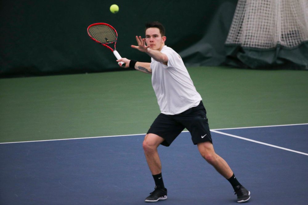 Iowa's Jonas Larsen at a tennis match vs Drake Friday, March 8, 2019 at the Hawkeye Tennis and Recreation Complex. (Lily Smith/hawkeyesports.com)