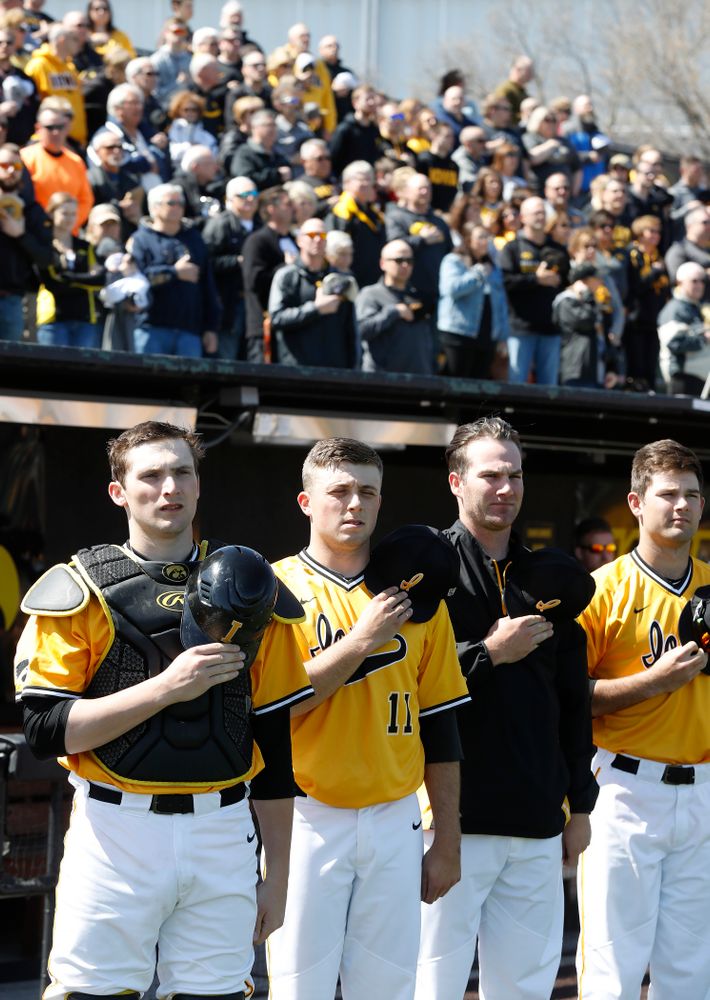 Iowa Hawkeyes catcher Brett McCleary (32), pitcher Cole McDonald (11), and pitcher Nick Allgeyer (24) before their game against the Michigan Wolverines Sunday, April 29, 2018 at Duane Banks Field. (Brian Ray/hawkeyesports.com)