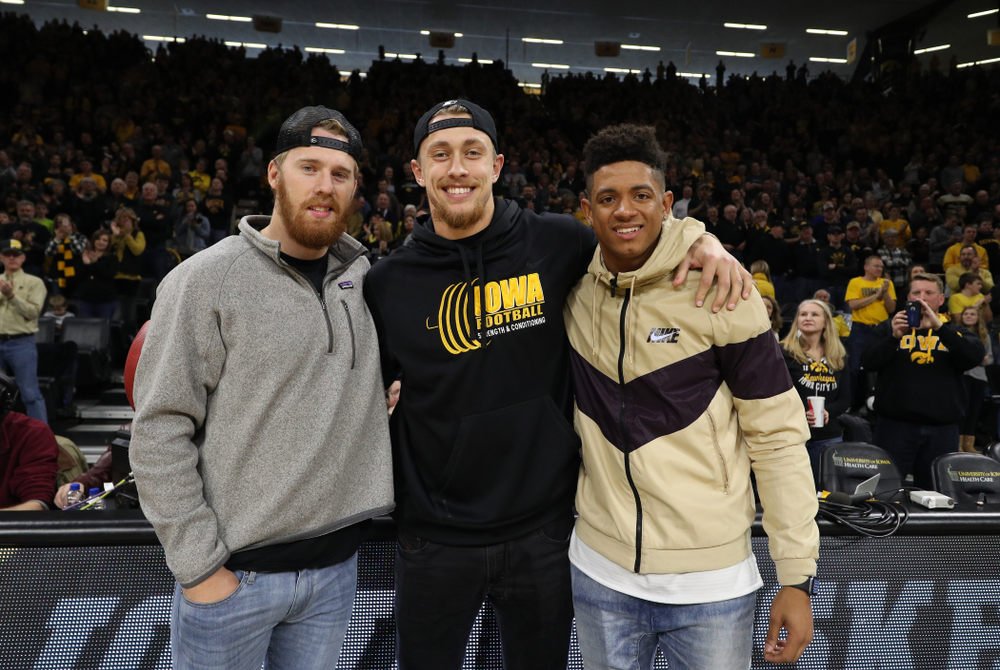 Former Hawkeye Football players and current San Francisco 49ers George Kittle, Greg Mabin, and CJ Beathard, against the Ohio State Buckeyes Saturday, January 12, 2019 at Carver-Hawkeye Arena. (Brian Ray/hawkeyesports.com)