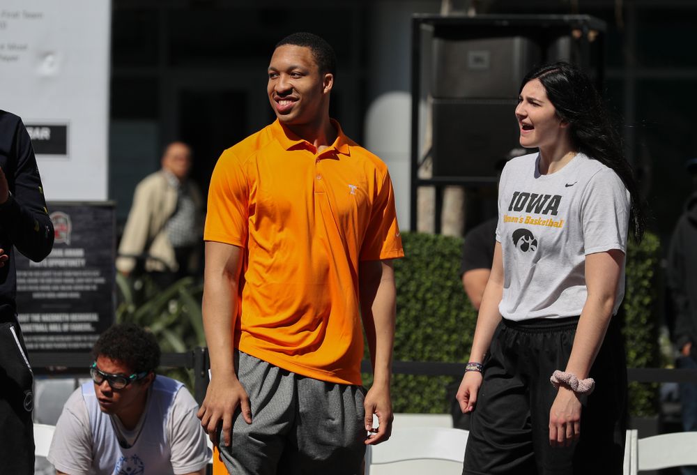 Iowa Hawkeyes forward Megan Gustafson (10) and TennesseeÕs Grant Williams during a Special Olympics event Friday, April 12, 2019 as part of the ESPN College Basketball Awards in the XBOX Plaza at LA Live. (Brian Ray/hawkeyesports.com)