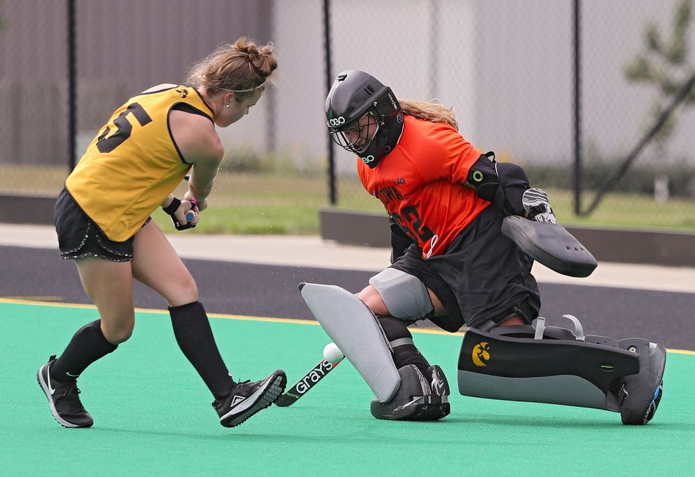 Iowa’s Grace McGuire (62) blocks a shot by Meghan Conroy (5) during practice at Grant Field in Iowa City on Thursday, Aug 15, 2019. (Stephen Mally/hawkeyesports.com)
