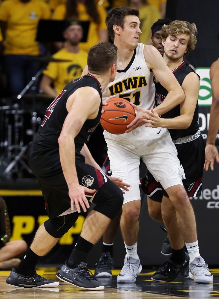 Iowa Hawkeyes forward Nicholas Baer (51) pulls down a rebound during a game against Guilford College at Carver-Hawkeye Arena on November 4, 2018. (Tork Mason/hawkeyesports.com)