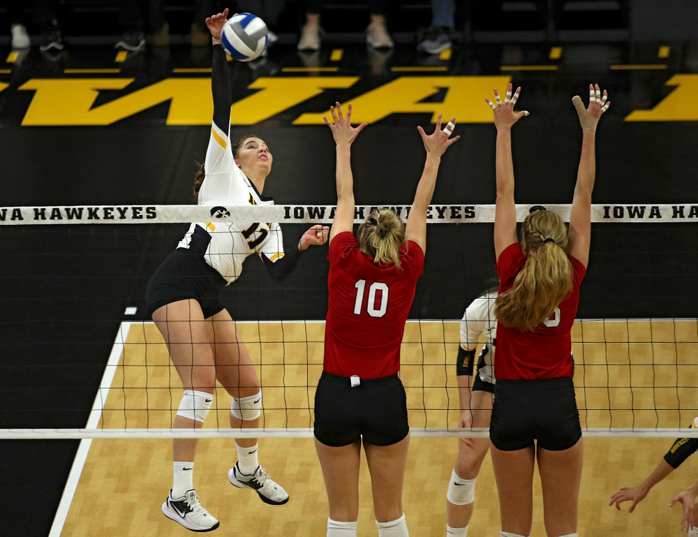 Iowa’s Blythe Rients (11) goes up for a shot during the second set of their match against Nebraska at Carver-Hawkeye Arena in Iowa City on Saturday, Nov 9, 2019. (Stephen Mally/hawkeyesports.com)