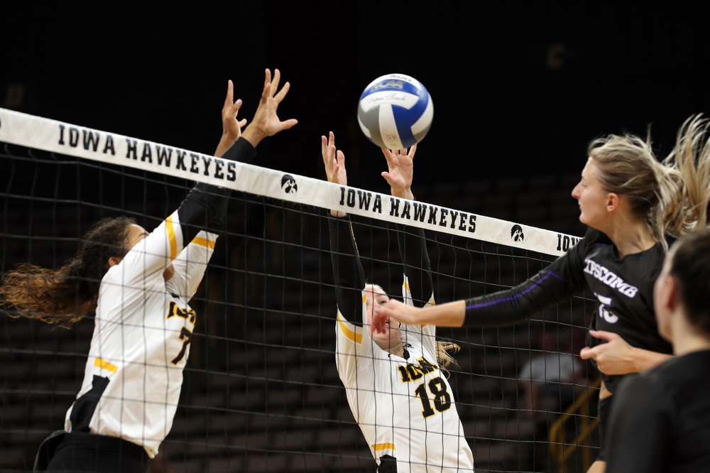 Iowa Hawkeyes middle blocker Hannah Clayton (18) and setter Brie Orr (7) against Lipscomb Friday, September 20, 2019 at Carver-Hawkeye Arena. (Brian Ray/hawkeyesports.com)
