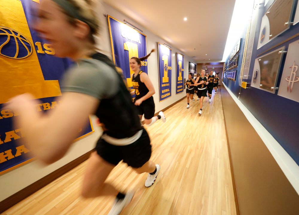 The Iowa Hawkeyes warmup before practice Friday, March 16, 2018 in the hallways of Pauley Pavilion on the campus of UCLA. (Brian Ray/hawkeyesports.com)