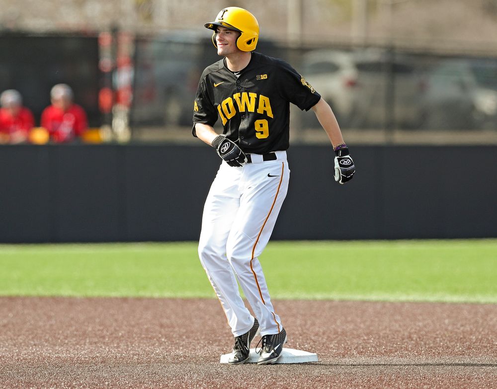 Iowa Hawkeyes center fielder Ben Norman (9) dances on second base after hitting an RBI double during the sixth inning of their game against Rutgers at Duane Banks Field in Iowa City on Saturday, Apr. 6, 2019. (Stephen Mally/hawkeyesports.com)