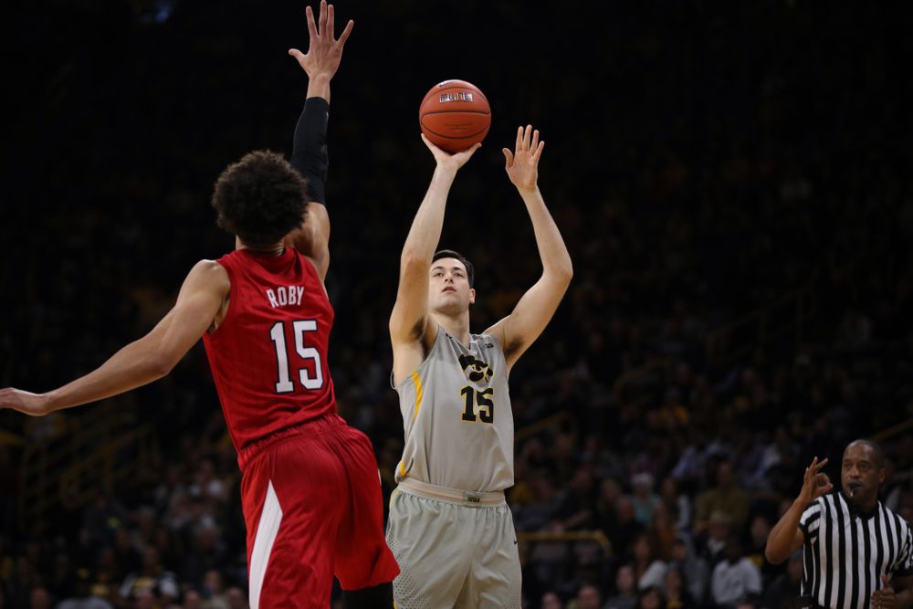 Iowa Hawkeyes forward Ryan Kriener (15) knocks down a three point basket against the Nebraska Cornhuskers Sunday, January 6, 2019 at Carver-Hawkeye Arena. (Brian Ray/hawkeyesports.com)