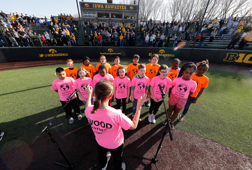 The National Anthem before the Hawkeyes game against the Michigan Wolverines Friday, April 27, 2018 at Duane Banks Field in Iowa City. (Brian Ray/hawkeyesports.com)