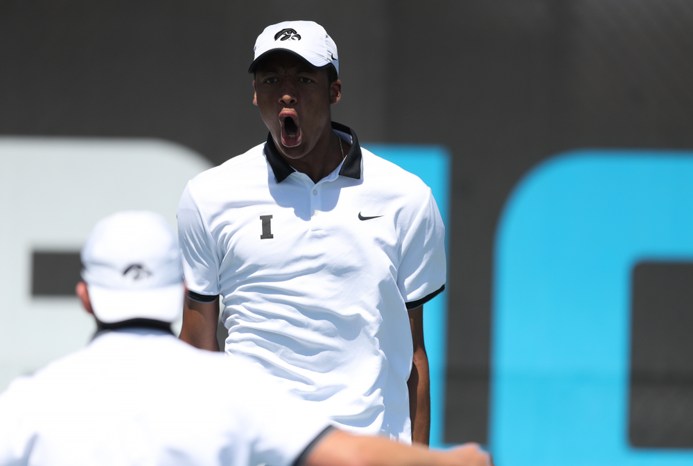 IowaÕs Oliver Okonkwo and Will Davies play a doubles match against the Michigan Wolverines Sunday, April 21, 2019 at the Hawkeye Tennis and Recreation Complex. (Brian Ray/hawkeyesports.com)