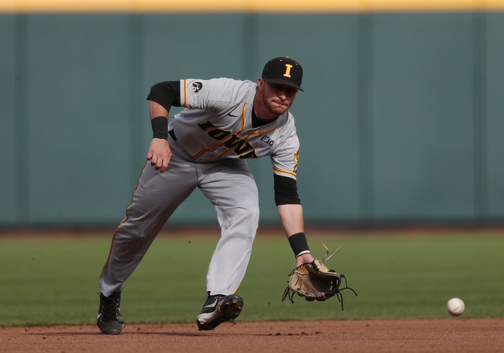 Iowa Hawkeyes Tanner Wetrich (16) fields a ground ball against the Indiana Hoosiers in the first round of the Big Ten Baseball Tournament Wednesday, May 22, 2019 at TD Ameritrade Park in Omaha, Neb. (Brian Ray/hawkeyesports.com)
