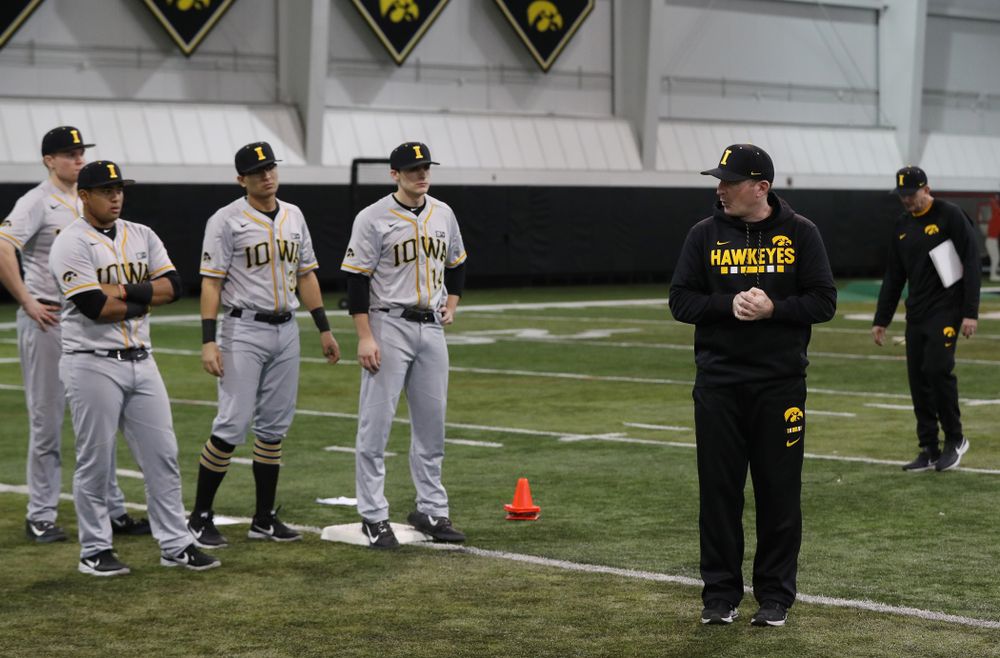 Iowa Hawkeyes associate head coach Marty Sutherland works on base running following the team's annual media day Tuesday, February 5, 2019 in the Indoor Practice Facility. (Brian Ray/hawkeyesports.com)