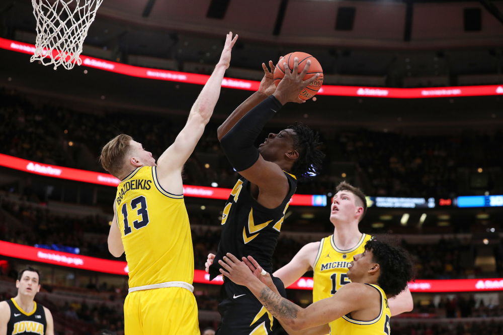 Iowa Hawkeyes forward Tyler Cook (25) against the Michigan Wolverines in the 2019 Big Ten Men's Basketball Tournament Friday, March 15, 2019 at the United Center in Chicago. (Brian Ray/hawkeyesports.com)