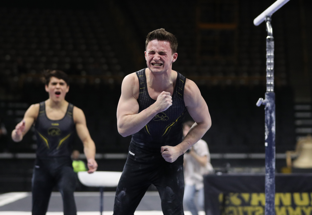 Iowa's Jake Brodarzon competes on the parallel bars against the Ohio State Buckeyes Saturday, March 16, 2019 at Carver-Hawkeye Arena. (Brian Ray/hawkeyesports.com)
