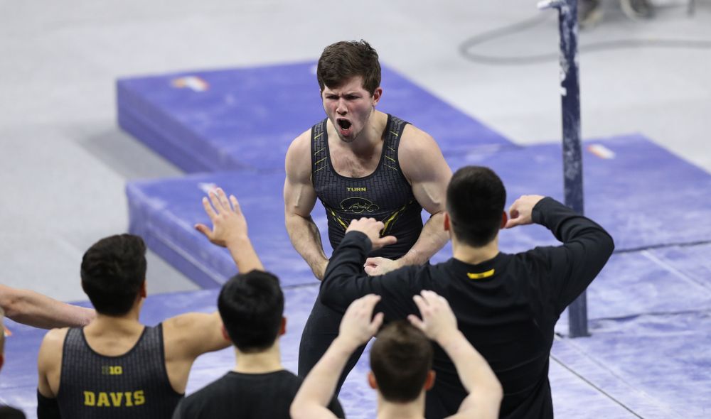 Iowa's Rogelio Vazquez competes on the parallel bars against Oklahoma Saturday, February 9, 2019 at Carver-Hawkeye Arena. (Brian Ray/hawkeyesports.com)