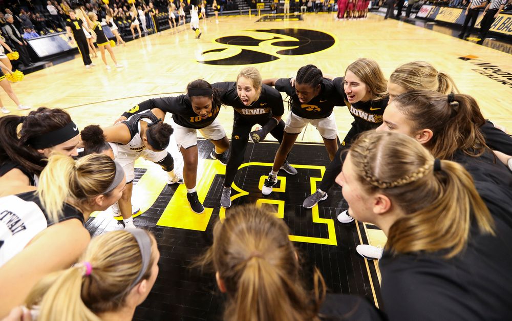 The Iowa Hawkeyes women's basketball team huddles up before a game against North Carolina Central at Carver-Hawkeye Arena on November 17, 2018. (Tork Mason/hawkeyesports.com)