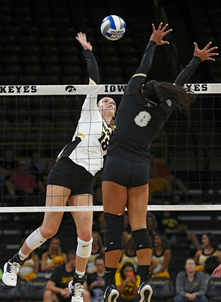 Iowa’s Hannah Clayton (18) lines up a shot during the second set of their Big Ten/Pac-12 Challenge match against Colorado at Carver-Hawkeye Arena in Iowa City on Friday, Sep 6, 2019. (Stephen Mally/hawkeyesports.com)