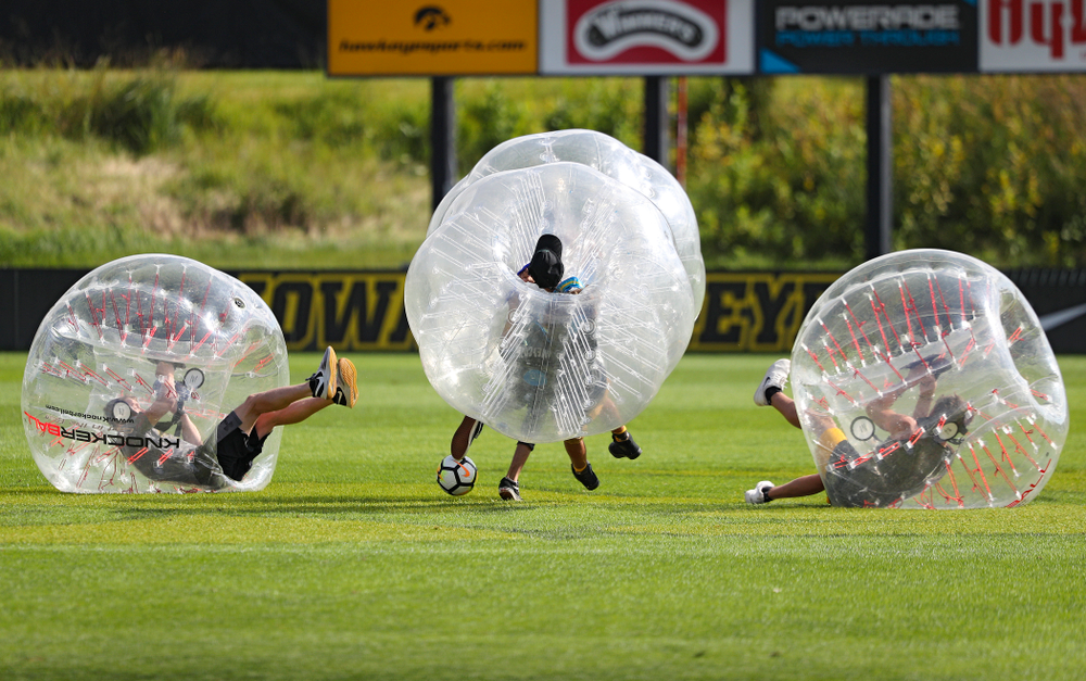 Four fans play KnockerBall soccer during halftime at the Iowa Soccer Complex in Iowa City on Sunday, Sep 1, 2019. (Stephen Mally/hawkeyesports.com)