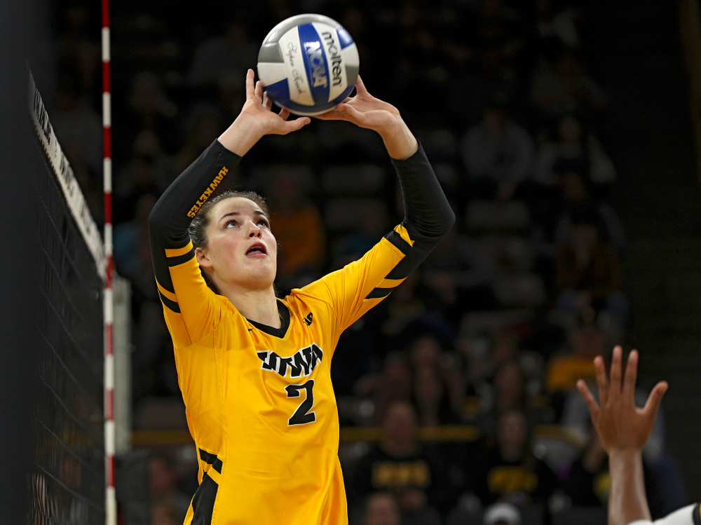 Iowa’s Courtney Buzzerio (2) sets the ball during the first set of their match at Carver-Hawkeye Arena in Iowa City on Friday, Nov 29, 2019. (Stephen Mally/hawkeyesports.com)