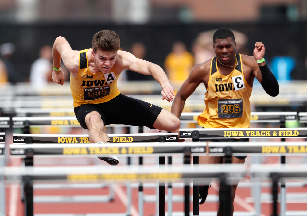 Iowa's Chris Douglas runs the 110 meter hurdles during the 2018 MUSCO Twilight Invitational Thursday, April 12, 2018 at the Cretzmeyer Trac