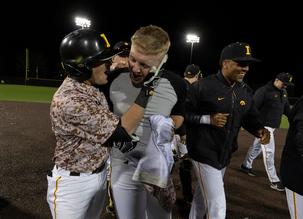 Iowa Hawkeyes Zeb Adreon (5) celebrates with his teammates after driving in the game winning run in the bottom of the 9th against the Nebraska Cornhuskers on Military Appreciation Night Friday, April 19, 2019 at Duane Banks Field. (Brian Ray/hawkeyesports.com)