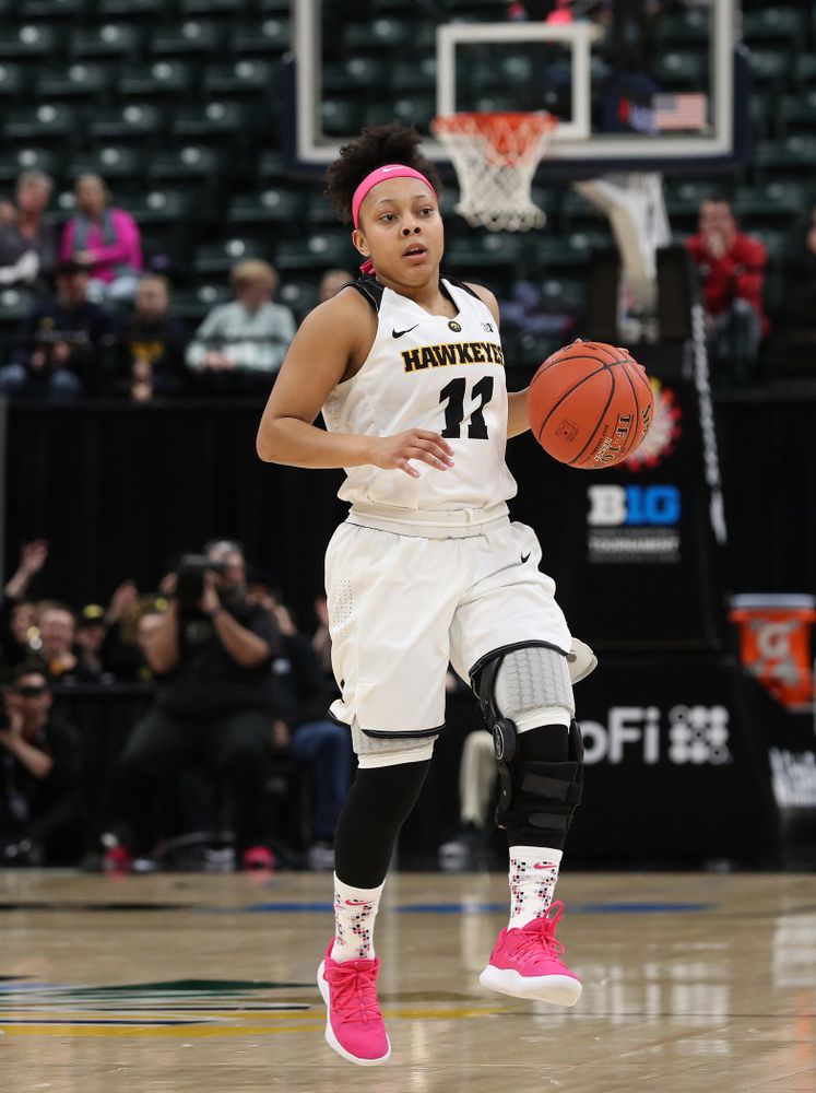 Iowa Hawkeyes guard Tania Davis (11) against the Rutgers Scarlet Knights in the semi-finals of the Big Ten Tournament Saturday, March 9, 2019 at Bankers Life Fieldhouse in Indianapolis, Ind. (Brian Ray/hawkeyesports.com)