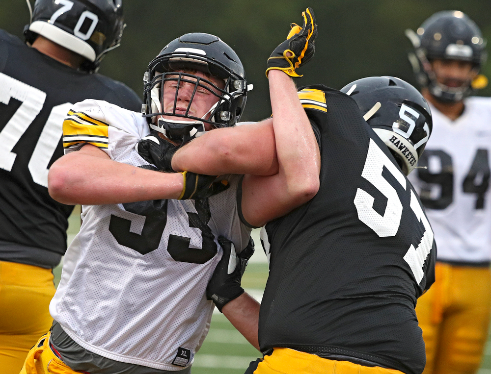 Iowa Hawkeyes defensive lineman Jake Karchinski (93) tries to get around offensive lineman Clayton Thurm (57) durning Fall Camp Practice No. 17 at the Hansen Football Performance Center in Iowa City on Wednesday, Aug 21, 2019. (Stephen Mally/hawkeyesports.com)