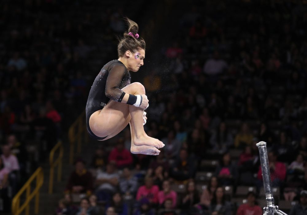 Iowa's Jax Krantz competes on the bars during their meet against the Minnesota Golden Gophers Saturday, January 19, 2019 at Carver-Hawkeye Arena. (Brian Ray/hawkeyesports.com)