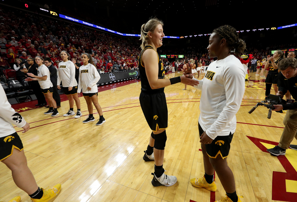 Iowa Hawkeyes forward/center Monika Czinano (25) and guard Zion Sanders (21) against the Iowa State Cyclones Wednesday, December 11, 2019 at Hilton Coliseum in Ames, Iowa(Brian Ray/hawkeyesports.com)