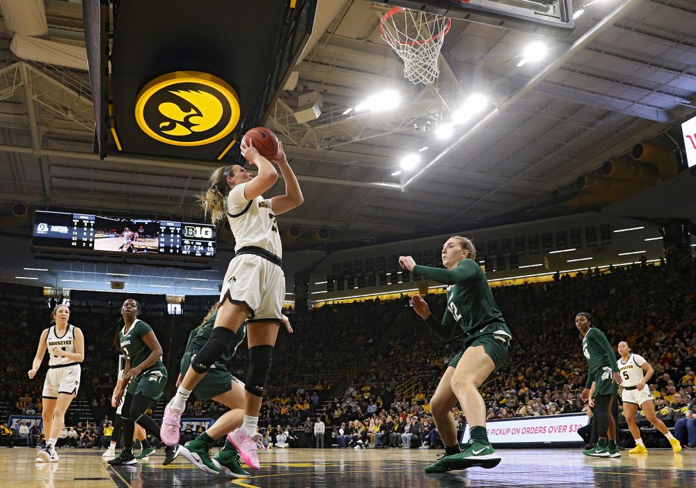 Iowa Hawkeyes guard Makenzie Meyer (3) scores a basket during the second quarter of their game at Carver-Hawkeye Arena in Iowa City on Sunday, January 26, 2020. (Stephen Mally/hawkeyesports.com)