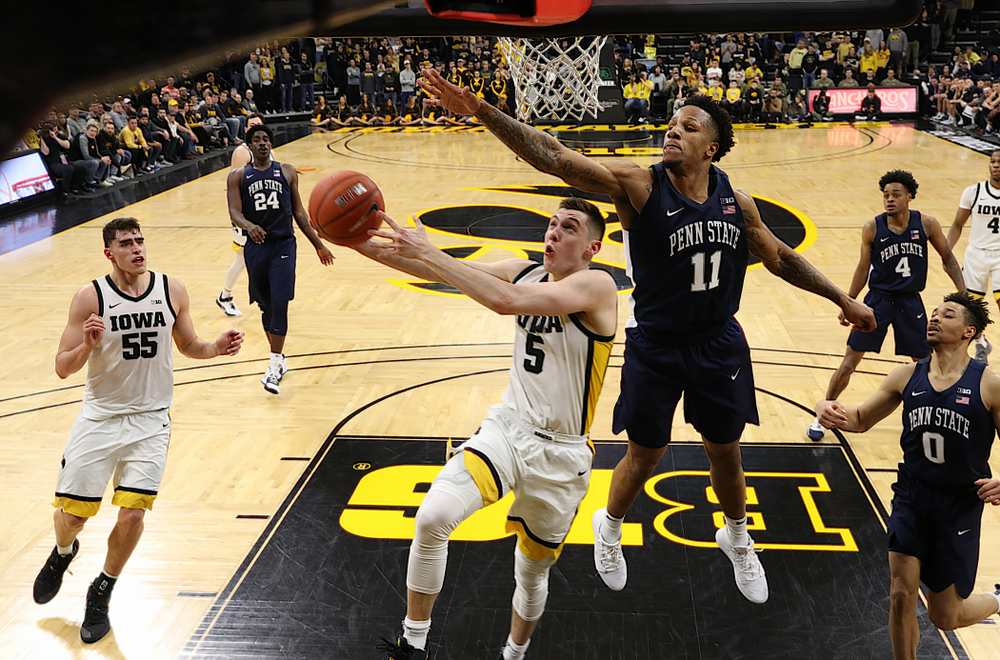 Iowa Hawkeyes guard CJ Fredrick (5) goes to the hoop against Penn State Saturday, February 29, 2020 at Carver-Hawkeye Arena. (Brian Ray/hawkeyesports.com)