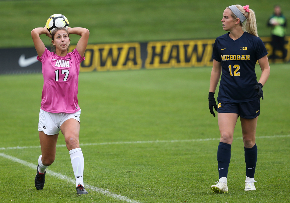 Iowa Hawkeyes defender Hannah Drkulec (17) throws the ball in during a game against Michigan at the Iowa Soccer Complex on October 14, 2018. (Tork Mason/hawkeyesports.com)