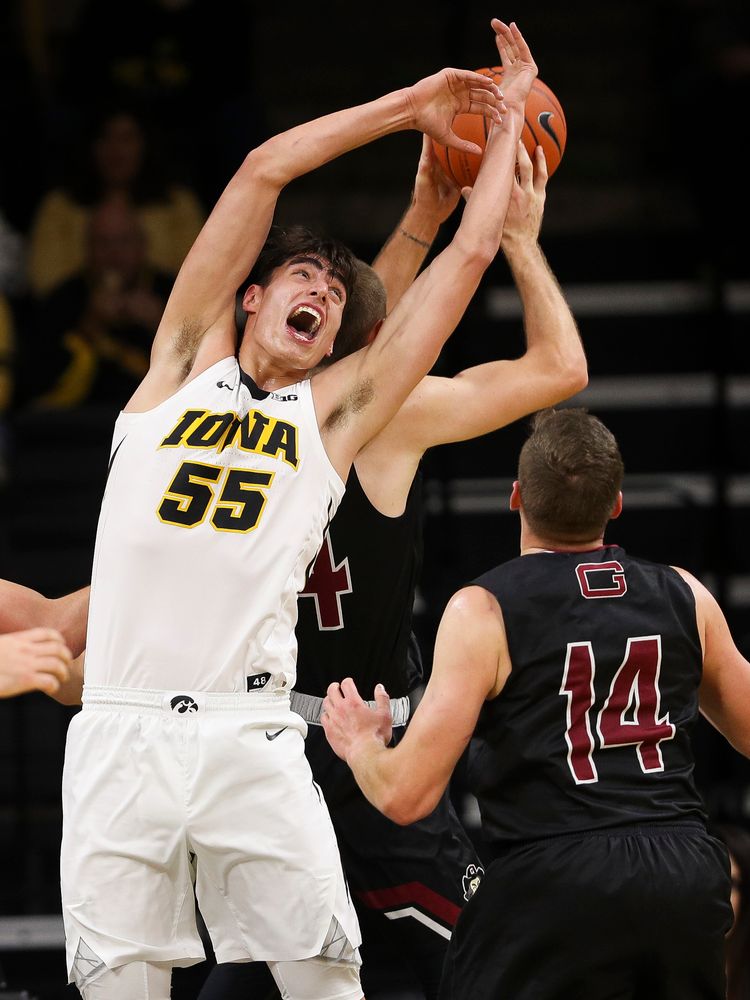 Iowa Hawkeyes forward Luka Garza (55) goes up for a rebound during a game against Guilford College at Carver-Hawkeye Arena on November 4, 2018. (Tork Mason/hawkeyesports.com)