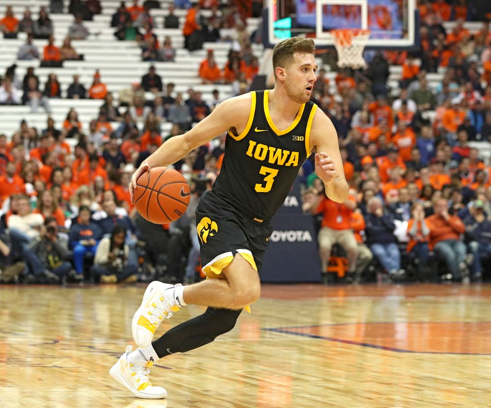 Iowa Hawkeyes guard Jordan Bohannon (3) drives with the ball during the second half of their ACC/Big Ten Challenge game at the Carrier Dome in Syracuse, N.Y. on Tuesday, Dec 3, 2019. (Stephen Mally/hawkeyesports.com)