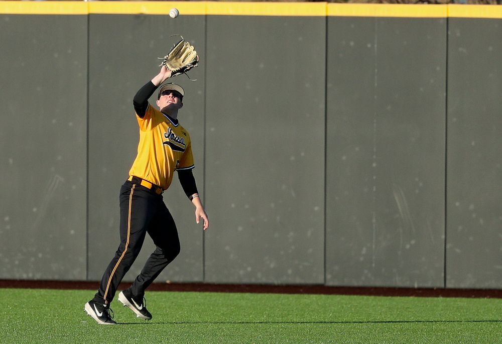 Iowa Hawkeyes right fielder Zeb Adreon (5) pulls in a fly ball for an out during the eighth inning of their game at Duane Banks Field in Iowa City on Tuesday, Apr. 2, 2019. (Stephen Mally/hawkeyesports.com)