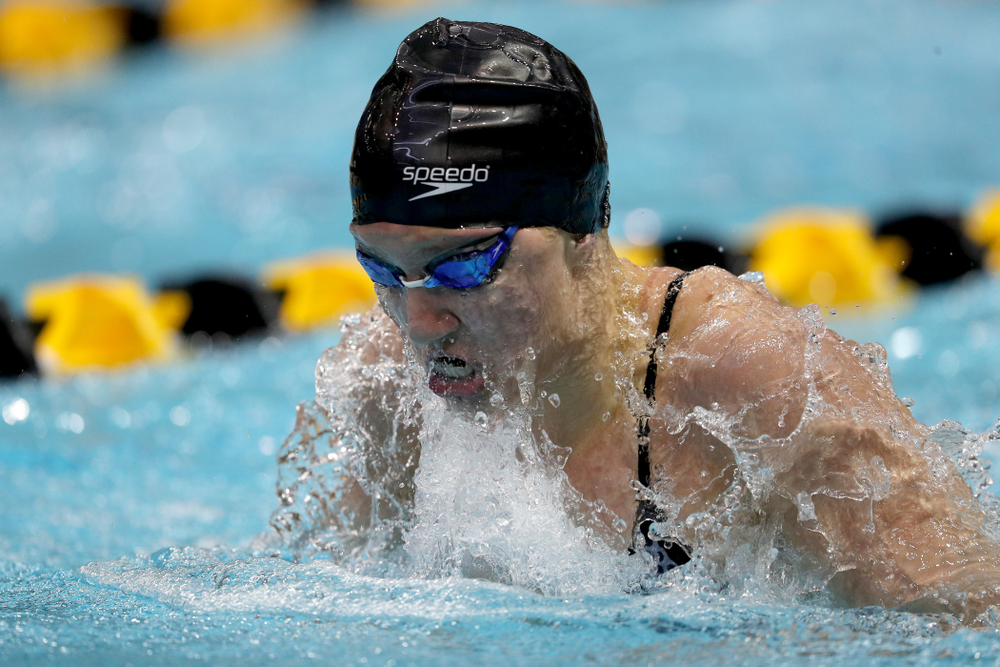 IowaÕs Sage Ohlensehlen competes in the 100 yard breaststroke against Notre Dame and Illinois Saturday, January 11, 2020 at the Campus Recreation and Wellness Center. (Brian Ray/hawkeyesports.com)