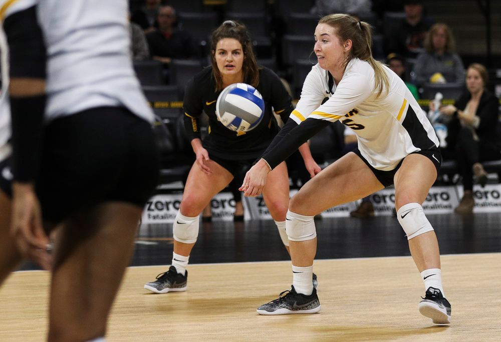 Iowa Hawkeyes outside hitter Meghan Buzzerio (5) bumps the ball during a match against Nebraska at Carver-Hawkeye Arena on November 7, 2018. (Tork Mason/hawkeyesports.com)