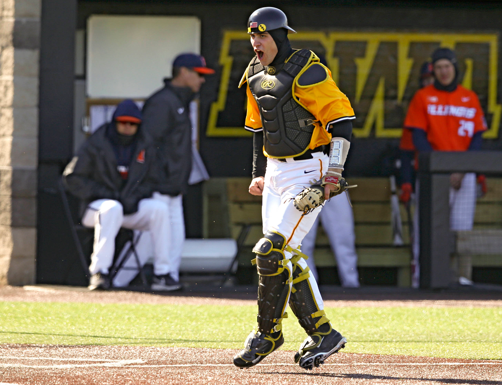 Iowa Hawkeyes catcher Austin Martin (34) is pumped up after completing an inning ending double play during the eighth inning against Illinois at Duane Banks Field in Iowa City on Sunday, Mar. 31, 2019. (Stephen Mally/hawkeyesports.com)