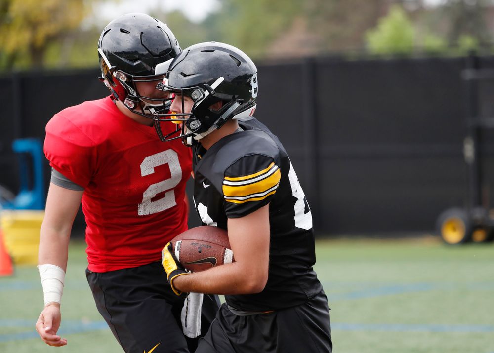 Iowa Hawkeyes wide receiver Nico Ragaini (89) and quarterback Peyton Mansell (2) during practice No. 4 of Fall Camp Monday, August 6, 2018 at the Hansen Football Performance Center. (Brian Ray/hawkeyesports.com)
