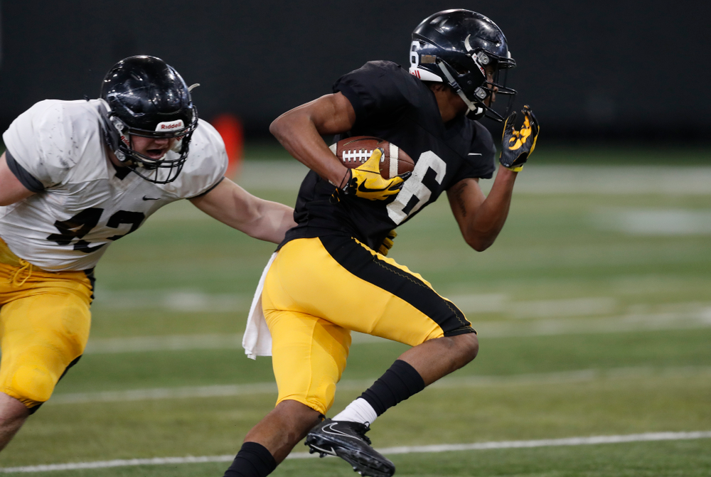 Iowa Hawkeyes wide receiver Ihmir Smith-Marsette (6) and linebacker Dillon Doyle during spring practice Thursday, March 29, 2018 at the Hansen Football Performance Center. (Brian Ray/hawkeyesports.com)