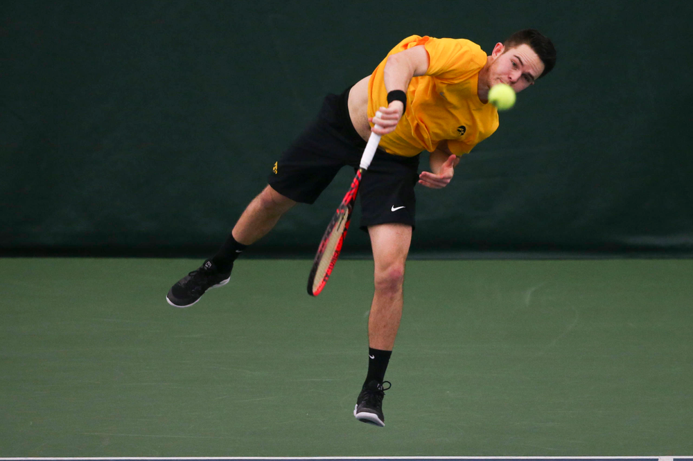 Iowa's Jonas Larsen at a tennis match vs Drake Friday, March 8, 2019 at the Hawkeye Tennis and Recreation Complex. (Lily Smith/hawkeyesports.com)
