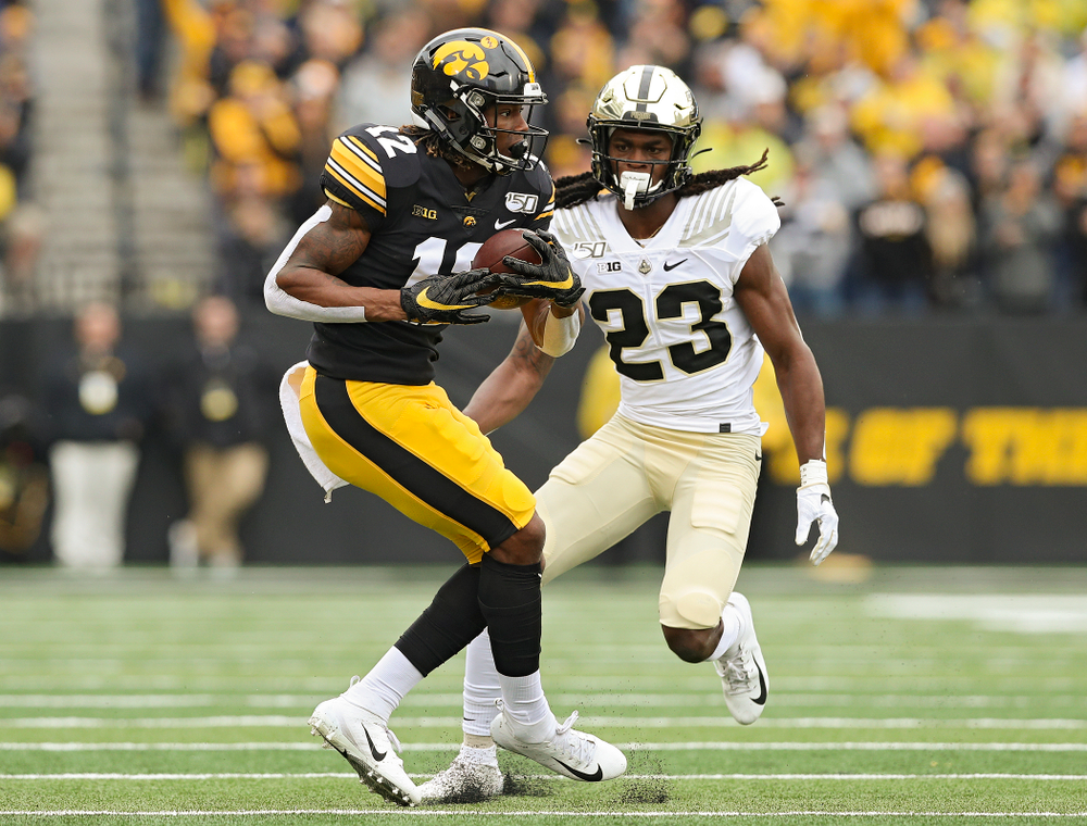 Iowa Hawkeyes wide receiver Brandon Smith (12) makes a catch during the first quarter of their game at Kinnick Stadium in Iowa City on Saturday, Oct 19, 2019. (Stephen Mally/hawkeyesports.com)