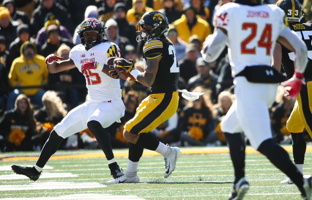 Iowa Hawkeyes defensive back Amani Hooker (27) makes an interception during a game against Maryland at Kinnick Stadium on October 20, 2018. (Tork Mason/hawkeyesports.com)