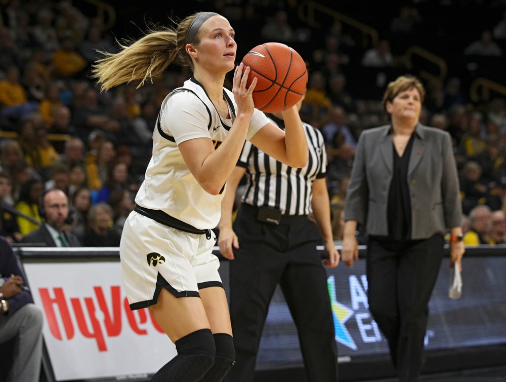 Iowa Hawkeyes guard Makenzie Meyer (3) lines up a 3-pointer during the second quarter of their game at Carver-Hawkeye Arena in Iowa City on Tuesday, December 31, 2019. (Stephen Mally/hawkeyesports.com)