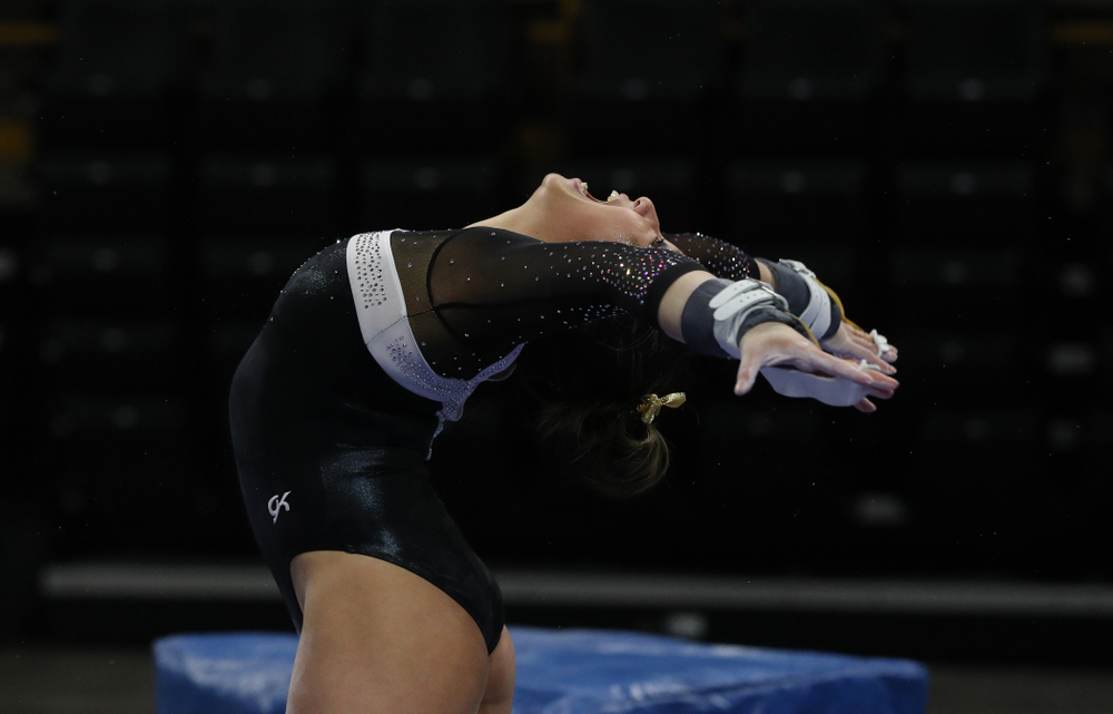 Iowa's Nicole Chowl competes on the bars against the Rutgers Scarlet Knights Saturday, January 26, 2019 at Carver-Hawkeye Arena. (Brian Ray/hawkeyesports.com)