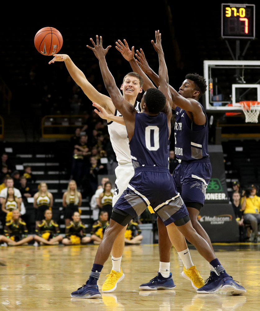 Iowa Hawkeyes guard Austin Ash (13) against North Florida Thursday, November 21, 2019 at Carver-Hawkeye Arena. (Brian Ray/hawkeyesports.com)
