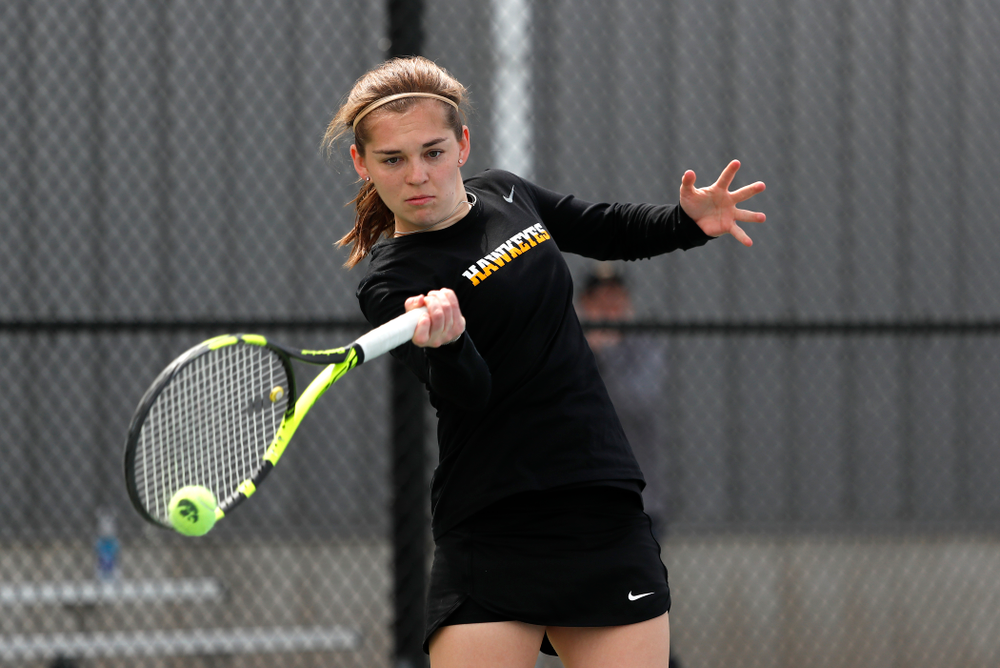 Iowa's Zoe Douglas against the Wisconsin Badgers Sunday, April 22, 2018 at the Hawkeye Tennis and Recreation Center. (Brian Ray/hawkeyesports.com)