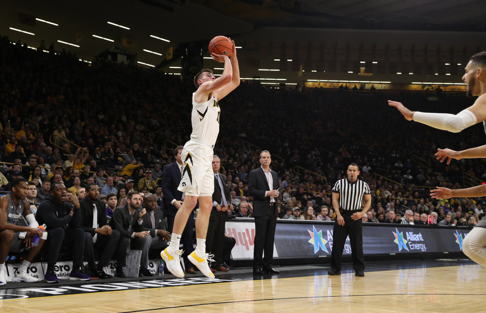 Iowa Hawkeyes guard Joe Wieskamp (10) knocks down a three point basket against the Northwestern Wildcats Sunday, February 10, 2019 at Carver-Hawkeye Arena. (Brian Ray/hawkeyesports.com)
